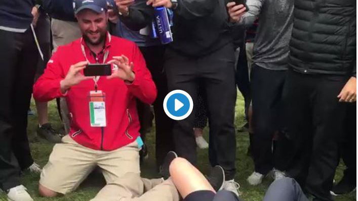 Henrik Stenson lays on the floor to take selfie with fan